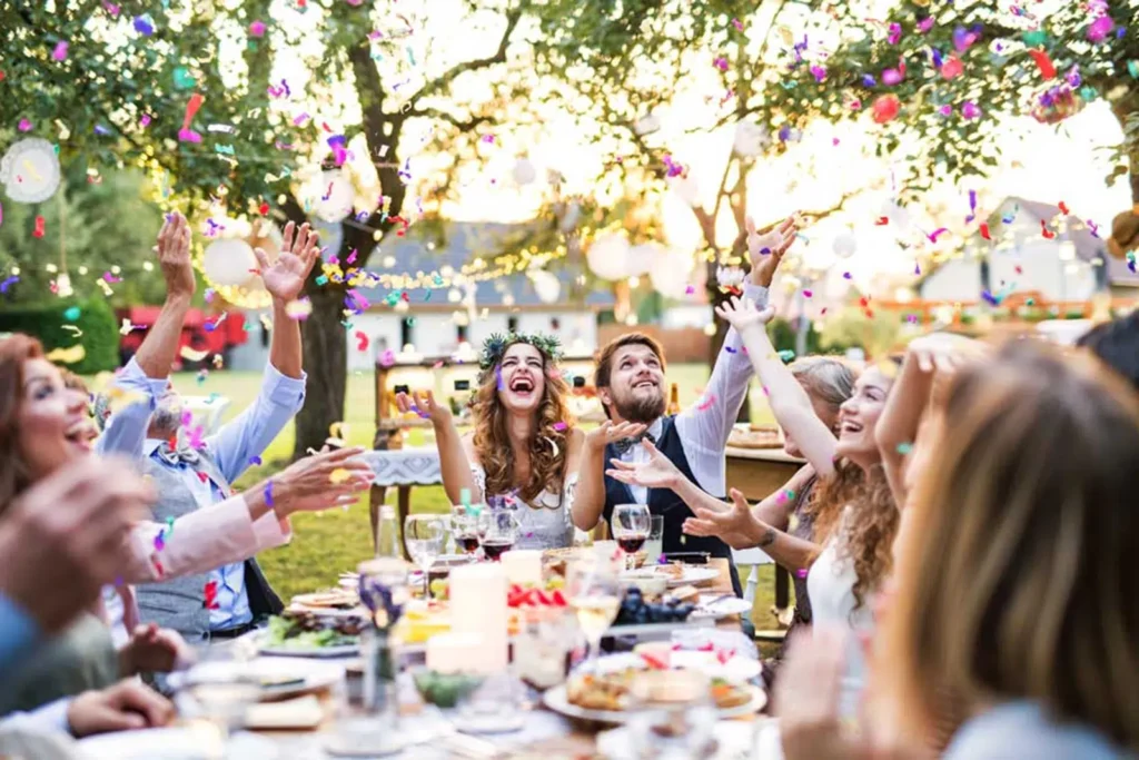 Newly Weds enjoy Bespoke Wedding Catering in Melbourne at an outside wedding arranged by White Knight Catering Services