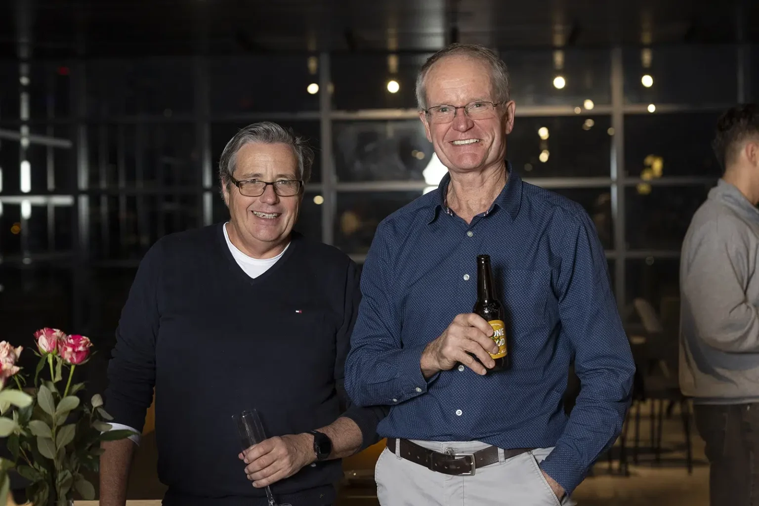 Two gentlemen enjoying drinks and Retirement Party Catering in Melbourne at a Private Function Room provide by White Knight Catering