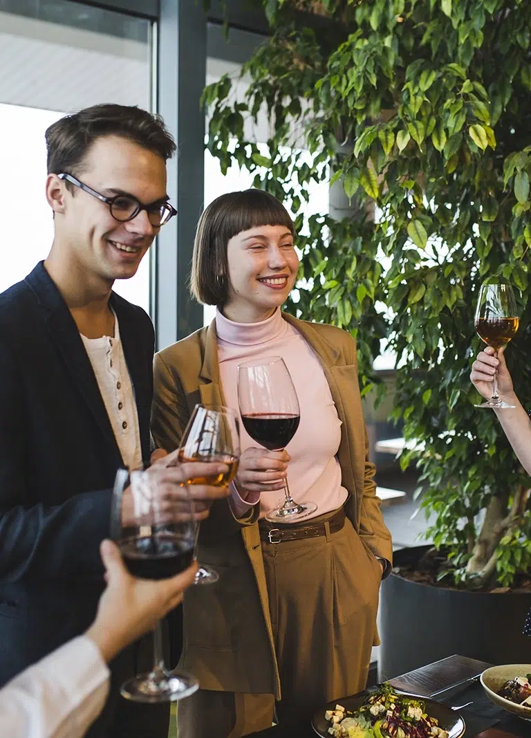 Engagement Party Catering In Melbourne with a couple enjoying drinks with family and friends