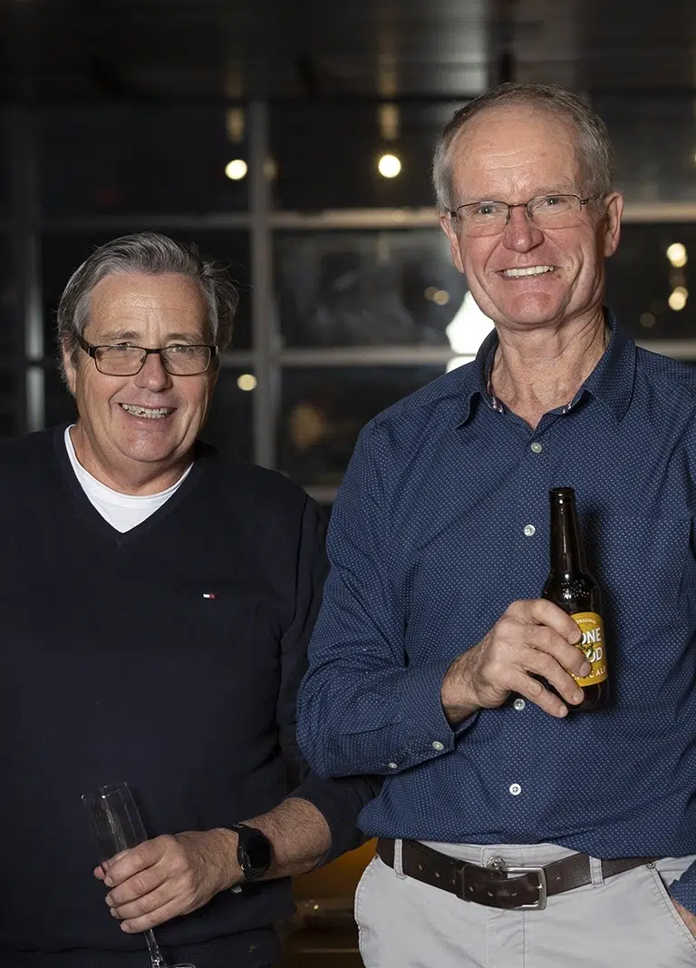Two gentlemen enjoying drinks and Retirement Party Catering in Melbourne at a Private Function Room provide by White Knight Catering